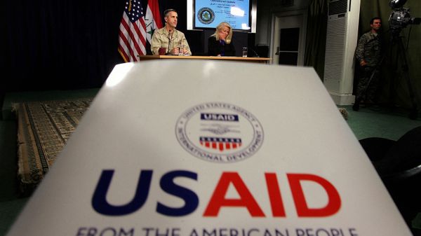 Denise Herbol (C-R), deputy director of the United States Agency for International Development – Iraq (USAID), and Rear Adm. Gregory Smith (L), director of the Multi-National Force-Iraq's Communications Division hold a joint press conference at the heavily fortified Green Zone area in Baghdad, 13 January 2008 Denise Herbol (C-R), deputy director of the United States Agency for International Development – Iraq (USAID), and Rear Adm. Gregory Smith (L), director of the Multi-National Force-Iraq's Communications Division hold a joint press conference at the heavily fortified Green Zone area in Baghdad, 13 January 2008 - Sputnik International