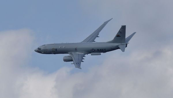A Boeing P-8-A Poseidon flies on display during Farnborough International Air Show, Farnborough, England, Tuesday, July 15, 2014. - Sputnik International