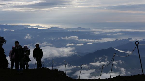 Climbers go up Mount Fuji, in Fujiyoshida city, Yamanashi prefecture, Japan, Thursday, July 4, 2013. Japan's most iconic landmark, Mount Fuji, the 3,776-meter-tall mountain was selected as a World Heritage site in June. - Sputnik International