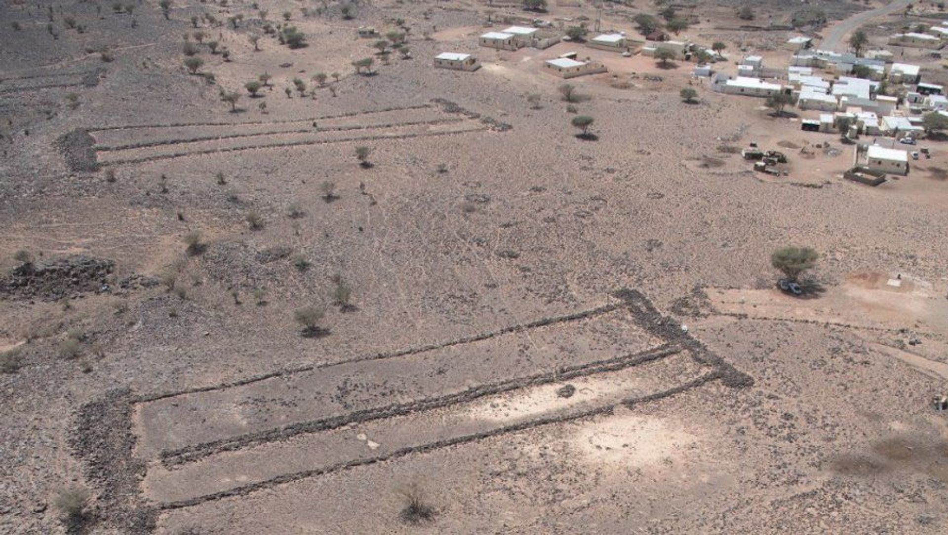 An aerial photo of the ancient monumental structures, known as mustatils, in Saudi Arabia. An aerial photo of the ancient monumental structures, known as mustatils, in Saudi Arabia. - Sputnik International, 1920, 01.05.2021
