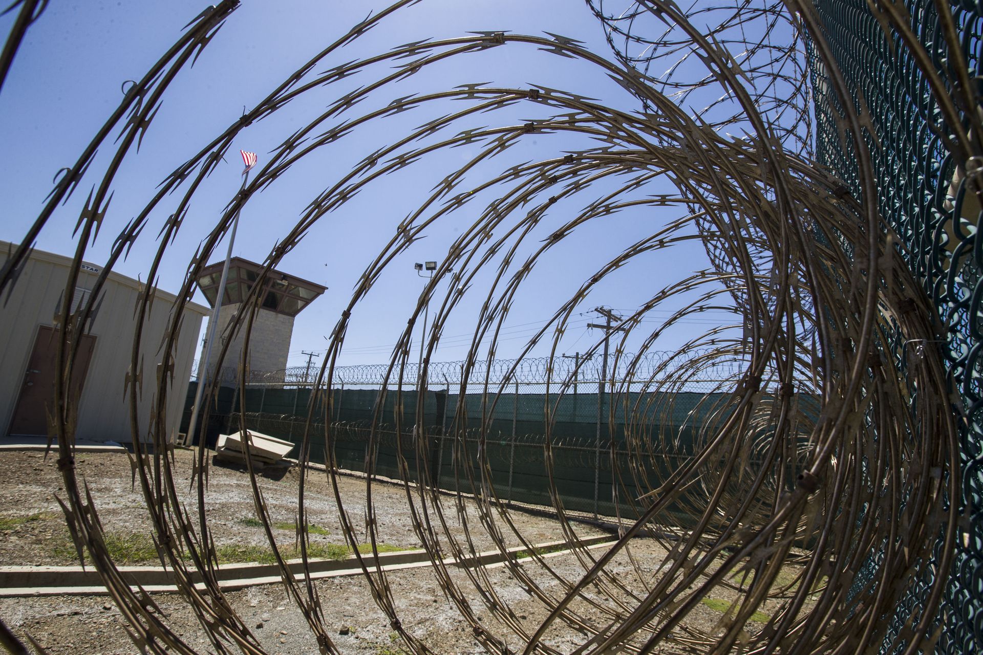 In this Wednesday, April 17, 2019 file photo reviewed by U.S. military officials, the control tower is seen through the razor wire inside the Camp VI detention facility in Guantanamo Bay Naval Base, Cuba. - Sputnik International, 1920, 07.09.2021
