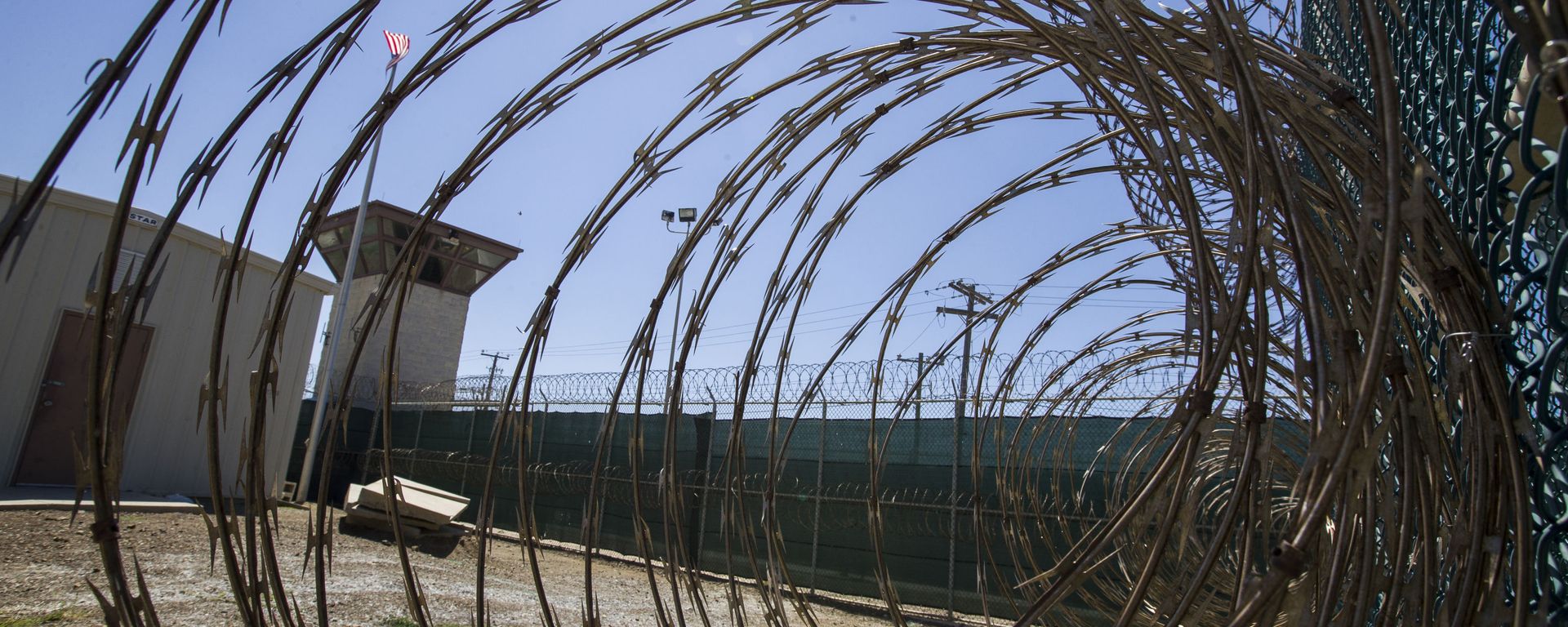 In this Wednesday, April 17, 2019 file photo reviewed by U.S. military officials, the control tower is seen through the razor wire inside the Camp VI detention facility in Guantanamo Bay Naval Base, Cuba. - Sputnik International, 1920, 03.05.2021