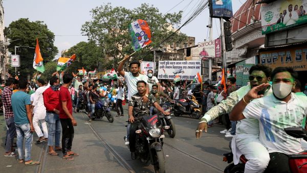 Supporters of Chief Minister of West Bengal state and the Chief of Trinamool Congress (TMC) Mamata Banerjee celebrate after the initial poll results, amidst the spread of the coronavirus disease (COVID-19), in Kolkata, India, May 2, 2021. Supporters of Chief Minister of West Bengal state and the Chief of Trinamool Congress (TMC) Mamata Banerjee celebrate after the initial poll results, amidst the spread of the coronavirus disease (COVID-19), in Kolkata, India, May 2, 2021. - Sputnik International