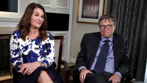 Microsoft co-founder Bill Gates and his wife Melinda sit during an interview in New York - Sputnik International