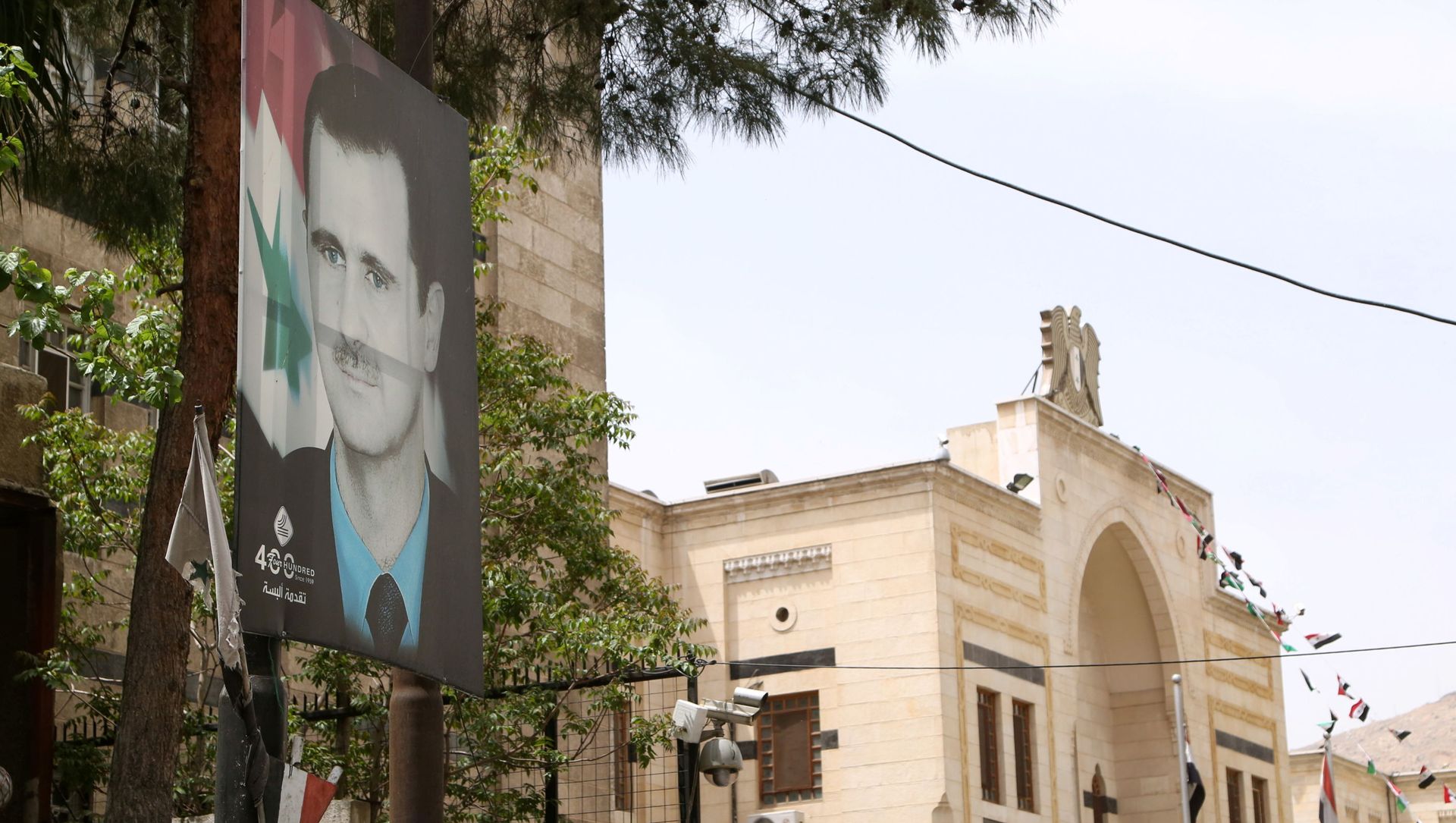 A picture of Syria's President Bashar al-Assad is pictured outside the parliament building in Damascus, Syria April 18, 2021. A picture of Syria's President Bashar al-Assad is pictured outside the parliament building in Damascus, Syria April 18, 2021. - Sputnik International, 1920, 04.05.2021