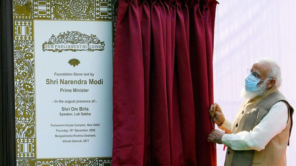This handout photograph taken on December 10, 2020 and released by the Indian Press Information Bureau (PIB), shows India’s Prime Minister Narendra Modi unveiling the plaque to lay the foundation stone of the new parliament building in New Delhi. - Sputnik International