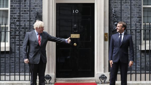 British Prime Minister Boris Johnson, left, meets with French President Emmanuel Macron at 10 Downing Street in London, Thursday, June 18, 2020. The President of the French Republic visits London to celebrate the 80th Anniversary of General de Gaulle's 'Appel' to the French population to resist the German occupation of France during WWII. - Sputnik International