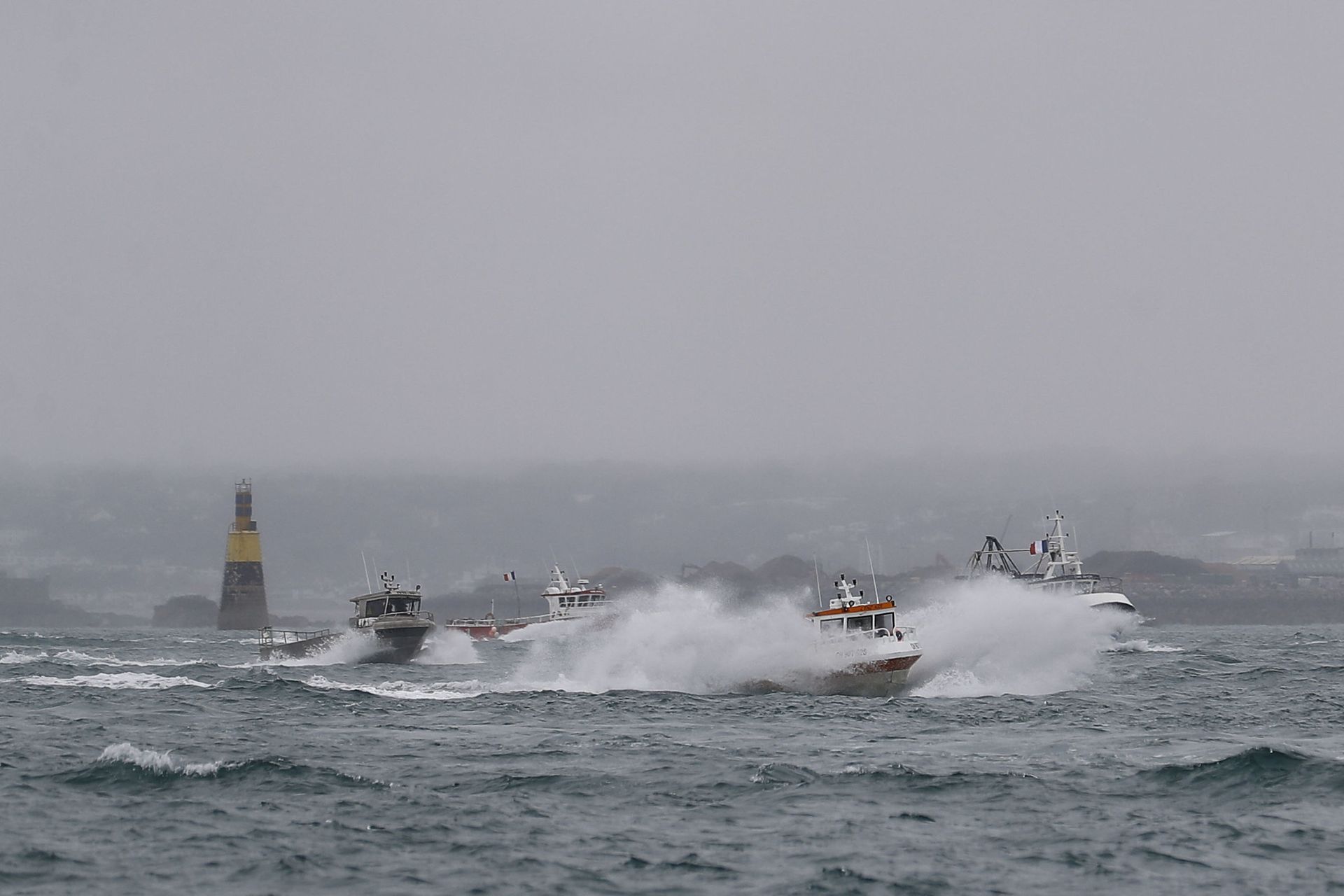 French fishing boats leave the Jersey waters following their protest in front of the port of Saint Helier off the British island of Jersey to draw attention to what they see as unfair restrictions on their ability to fish in UK waters after Brexit, on May 6, 2021. - Sputnik International, 1920, 07.11.2021