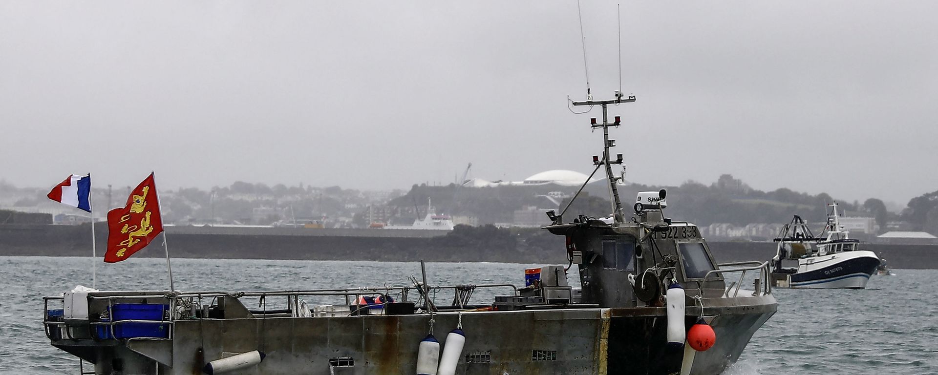 A French fishing boat, one of several, takes part in a protest in front of the port of Saint Helier off the British island of Jersey to draw attention to what they see as unfair restrictions on their ability to fish in UK waters after Brexit, on May 6, 2021. - A French fishing boat, one of several, takes part in a protest in front of the port of Saint Helier off the British island of Jersey to draw attention to what they see as unfair restrictions on their ability to fish in UK waters after Brexit, on May 6, 2021. - - Sputnik International, 1920, 06.10.2021