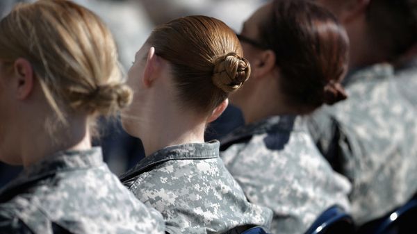 ARLINGTON, VA - MARCH 31: Soldiers, officers and civilian employees attend the commencement ceremony for the U.S. Army's annual observance of Sexual Assault Awareness and Prevention Month in the Pentagon Center Courtyard March 31, 2015 in Arlington, Virginia. In conjunction with the national campaign against sexual assault, The Army announced this year's theme, 'Not in My Squad. Not in Our Army. We are Trusted Professionals,' during the ceremony.К According to the Pentagon, the initative 'is a grassroots approach meant to reinforce a climate of dignity and respect founded on good order and discipline.'  - Sputnik International