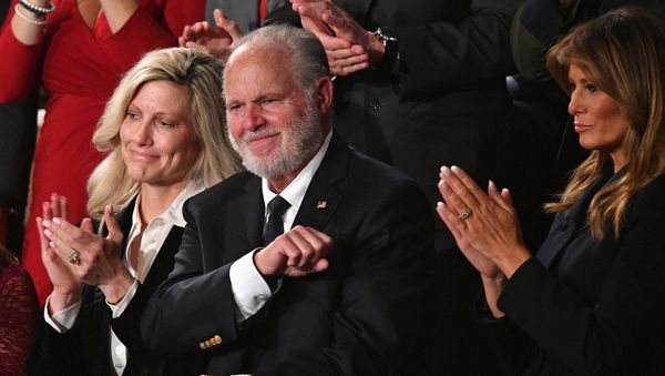 Radio personality Rush Limbaugh pumps his fist as he is acknowledged by US President Donald Trump as he delivers the State of the Union address at the US Capitol in Washington, DC, on February 4, 2020. - Sputnik International
