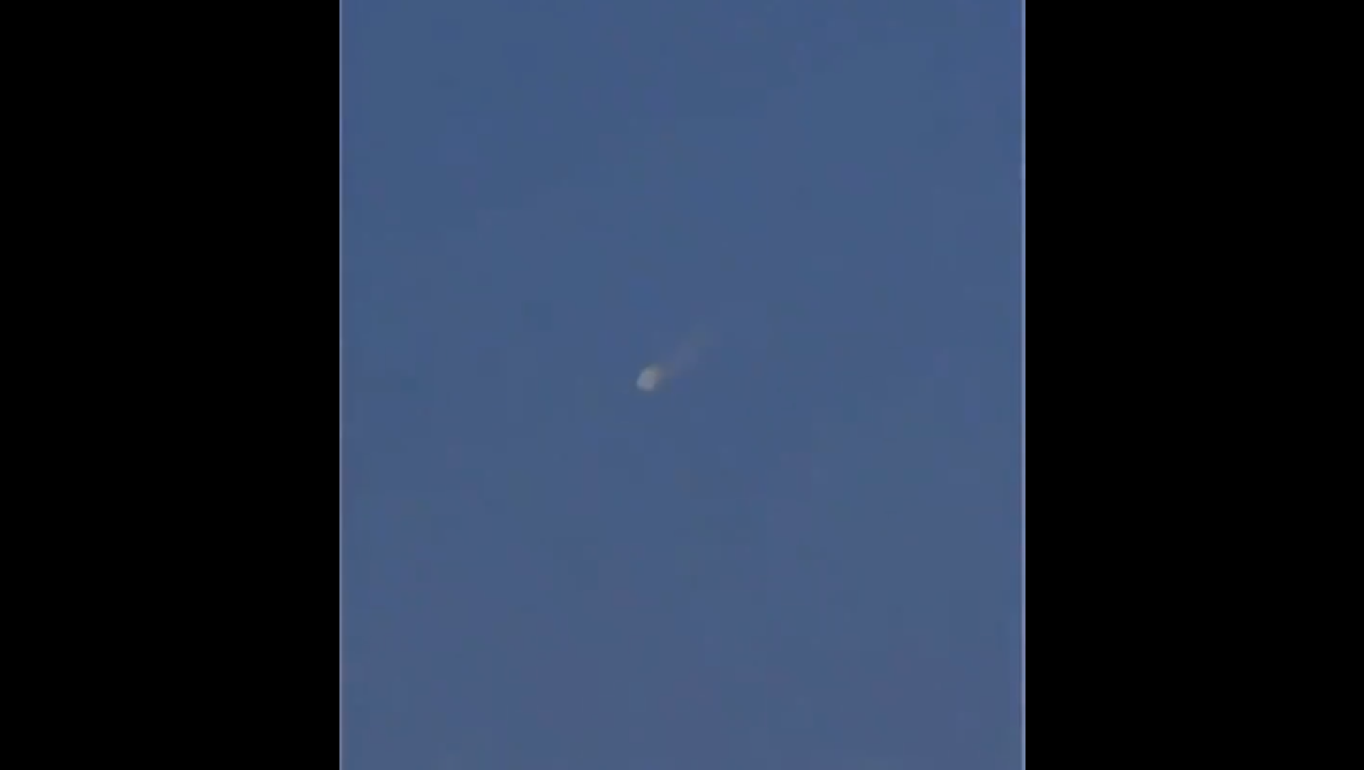 Screenshot from a video allegedly showing the remnants of the Chinese rocket re-entering the Earth's atmosphere Screenshot from a video allegedly showing the remnants of the Chinese rocket re-entering the Earth's atmosphere - Sputnik International, 1920, 09.05.2021