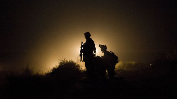 In this file photo taken on July 13, 2009, US Marines of 1st Combat Engineering Battalion of 2nd Marine Expeditionary Brigade stand guard as the search goes on for missing marines after an Improvised Explosive Device (IED) blast in Garmsir district of Helmand Province - Sputnik International