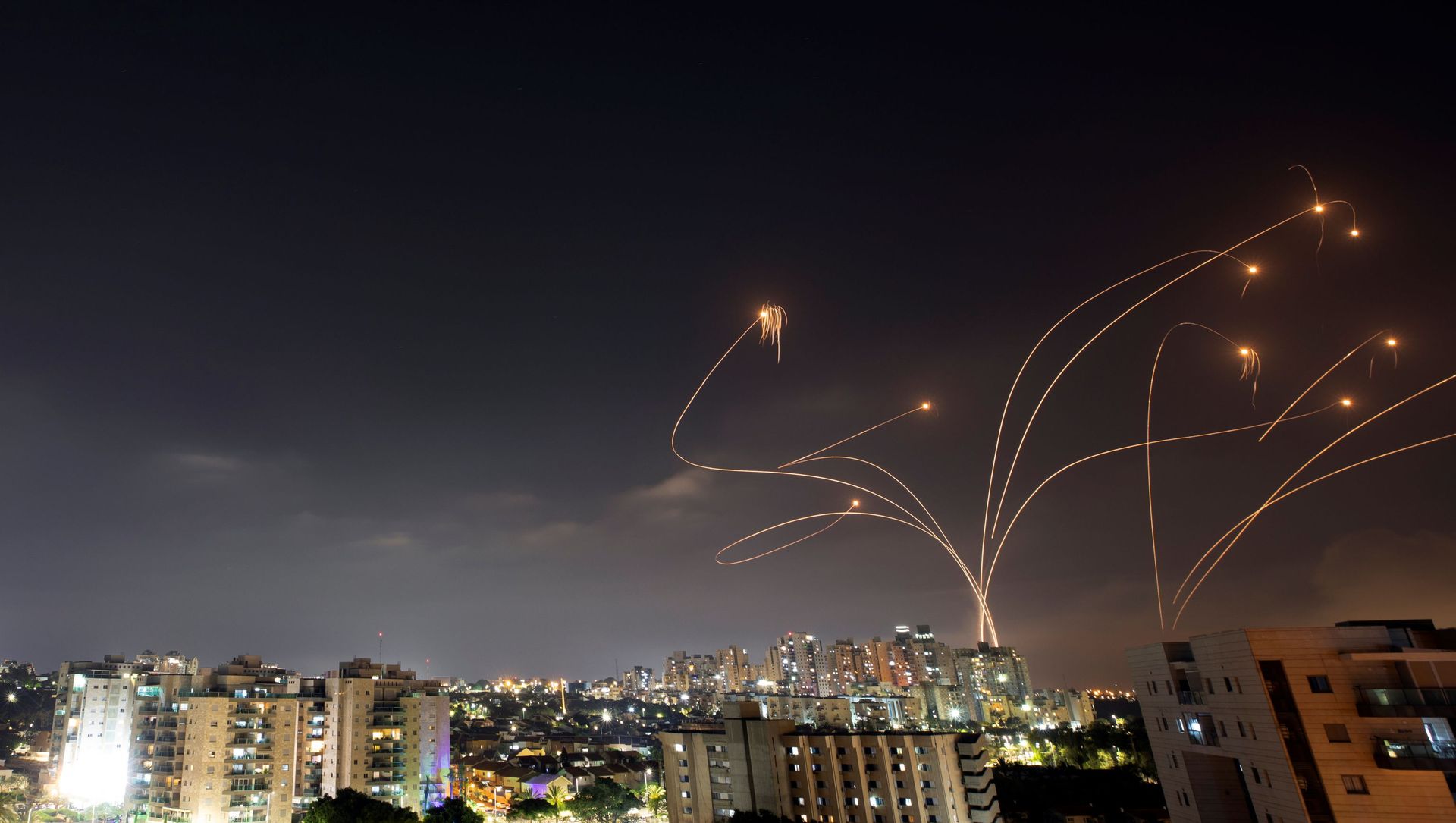 Streaks of light are seen as Israel's Iron Dome anti-missile system intercepts rockets launched from the Gaza Strip towards Israel, as seen from Ashkelon, Israel May 10, 2021. Streaks of light are seen as Israel's Iron Dome anti-missile system intercepts rockets launched from the Gaza Strip towards Israel, as seen from Ashkelon, Israel May 10, 2021. - Sputnik International, 1920, 10.05.2021