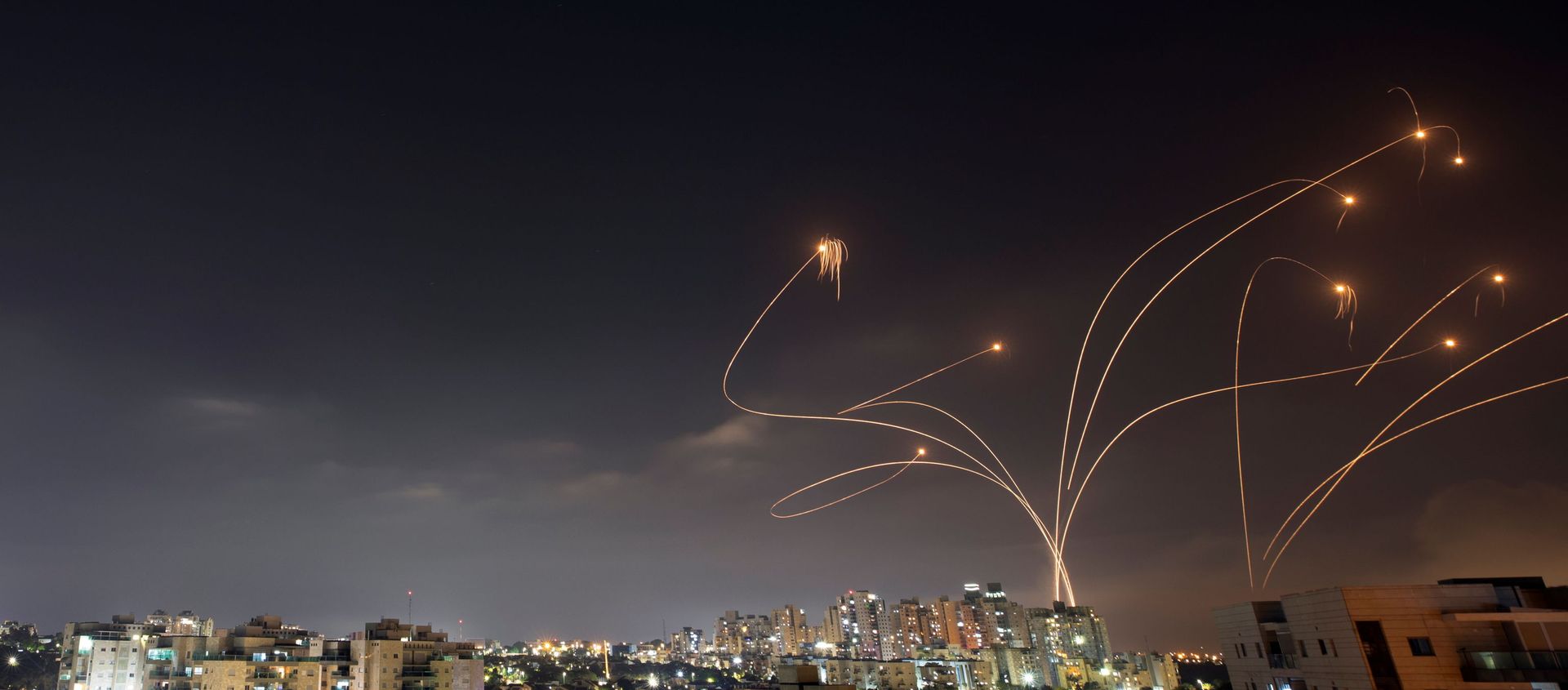 Streaks of light are seen as Israel's Iron Dome anti-missile system intercepts rockets launched from the Gaza Strip towards Israel, as seen from Ashkelon, Israel May 10, 2021. Streaks of light are seen as Israel's Iron Dome anti-missile system intercepts rockets launched from the Gaza Strip towards Israel, as seen from Ashkelon, Israel May 10, 2021. - Sputnik International, 1920