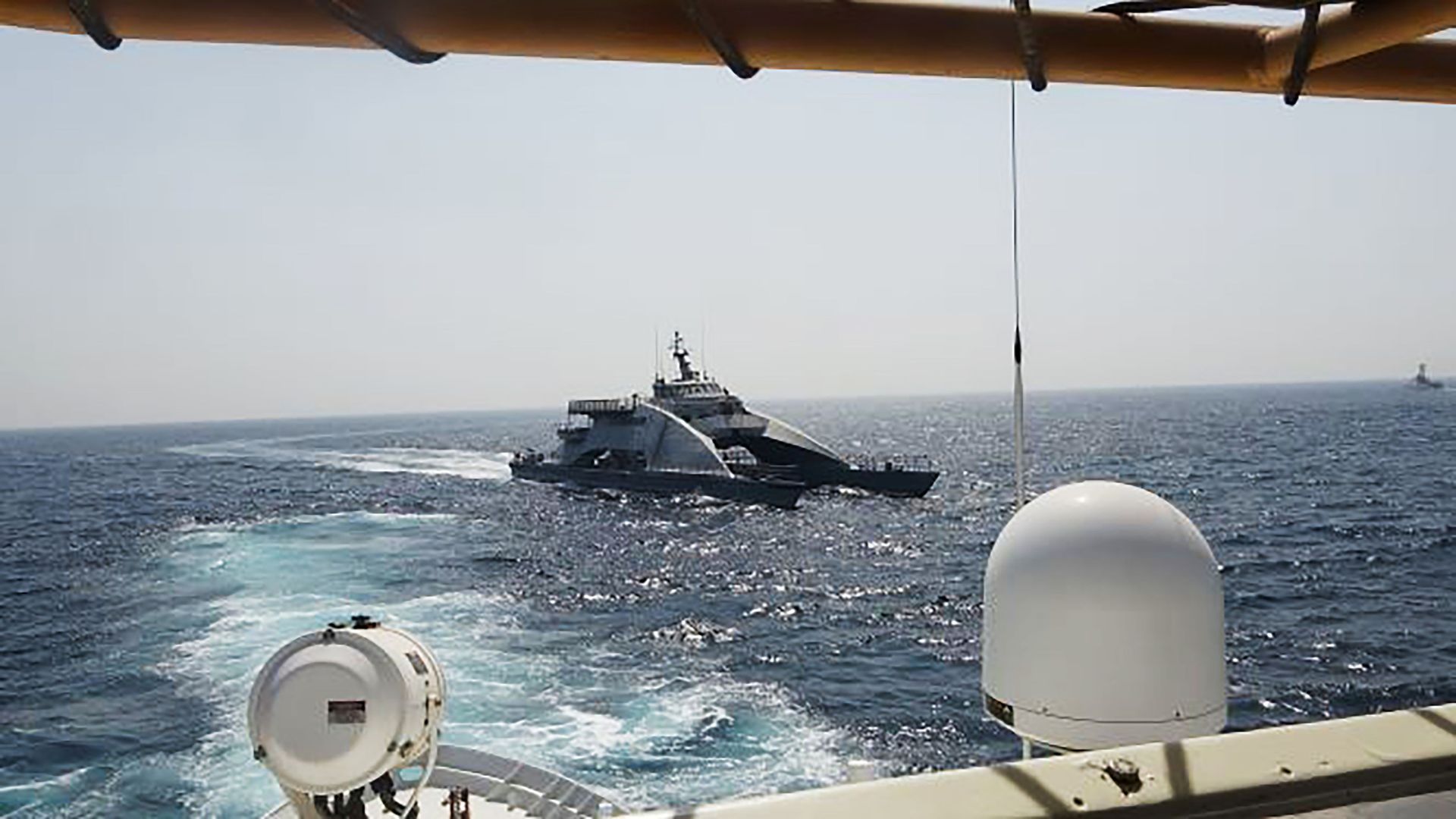 In an April 2, 2021, photo released by the U.S. Navy, an Iranian Revolutionary Guard vessel cuts in front of the U.S. Coast Guard ship USCGC Wrangell in the Persian Gulf In an April 2, 2021, photo released by the U.S. Navy, an Iranian Revolutionary Guard vessel cuts in front of the U.S. Coast Guard ship USCGC Wrangell in the Persian Gulf - Sputnik International, 1920, 10.05.2021
