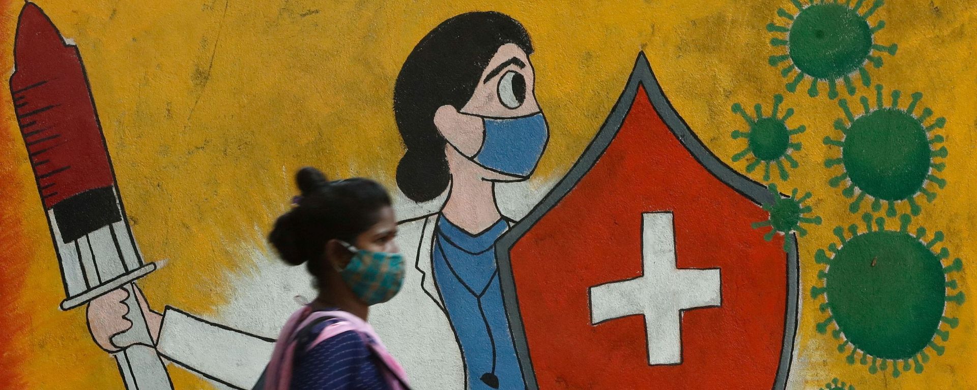 A woman walks past graffiti on a street, amidst the spread of the coronavirus disease (COVID-19) in Mumbai, India, 10 May 2021 A woman walks past graffiti on a street, amidst the spread of the coronavirus disease (COVID-19) in Mumbai, India, 10 May 2021 - Sputnik International, 1920, 01.06.2021
