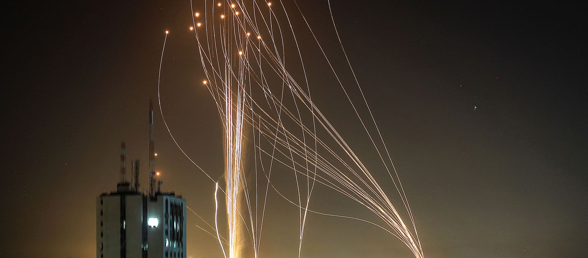 Rockets are launched from Gaza city, controlled by the Palestinian Hamas movement, in response to an Israeli air strike on a 12-storey building in the city, towards the coastal city of Tel Aviv, on May 11, 2021. Rockets are launched from Gaza city, controlled by the Palestinian Hamas movement, in response to an Israeli air strike on a 12-storey building in the city, towards the coastal city of Tel Aviv, on May 11, 2021. - Sputnik International, 1920