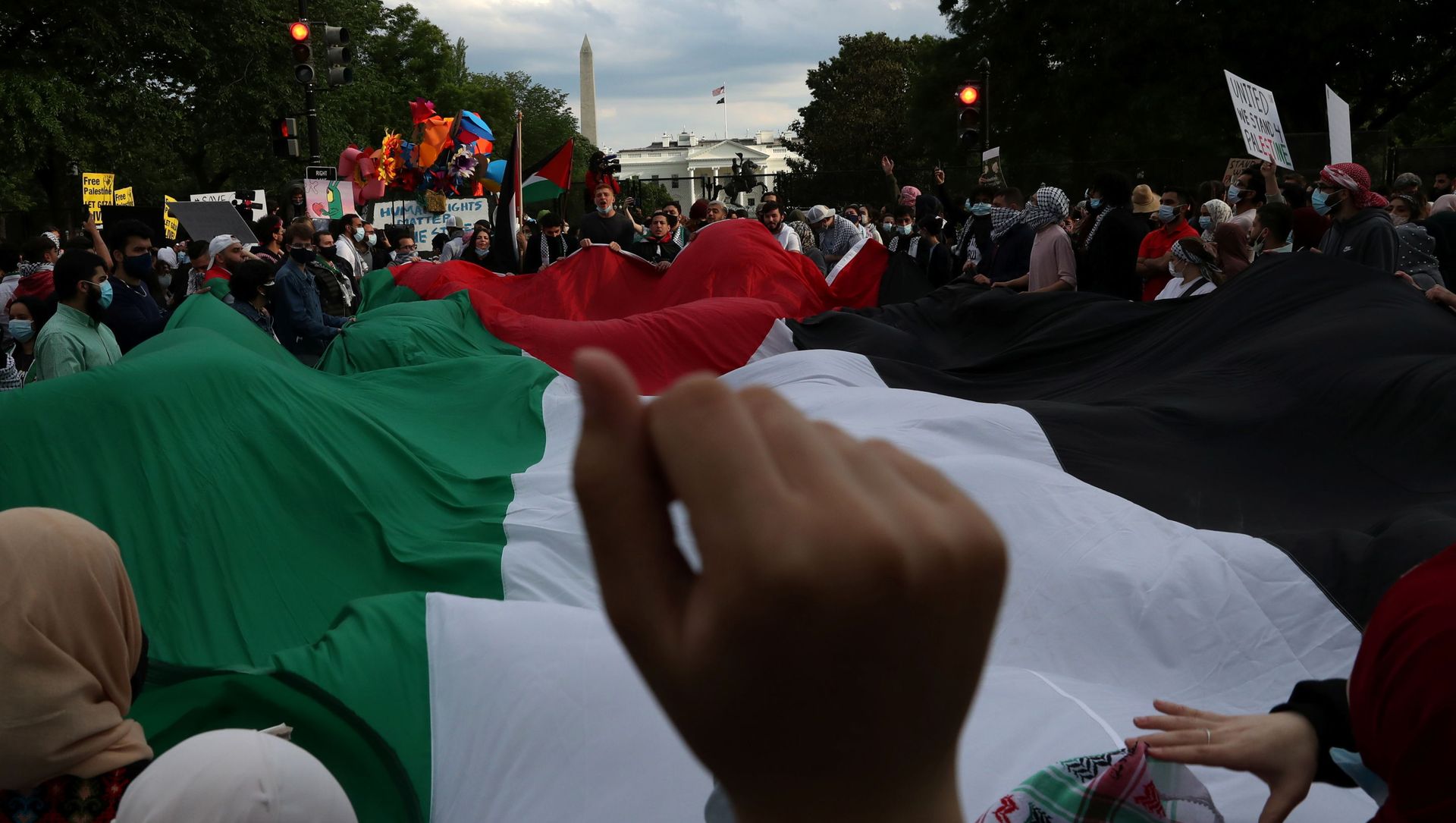 Pro-Palestinian demonstrators take part in a protest titled “Stop Jerusalem Expulsions, save Sheikh Jarrah” outside of the White House in Black Lives Matter Plaza after marching from the U.S. State Department building in Washington, U.S. May 11, 2021. Pro-Palestinian demonstrators take part in a protest titled “Stop Jerusalem Expulsions, save Sheikh Jarrah” outside of the White House in Black Lives Matter Plaza after marching from the U.S. State Department building in Washington, U.S. May 11, 2021. - Sputnik International, 1920, 15.06.2021