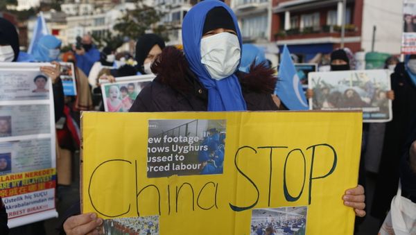 Members of the Uighur community in Turkey, hold a protest near China's consulate in Istanbul in February 2021. - Sputnik International