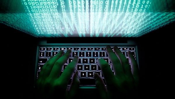 A man types on a computer keyboard in this illustration picture taken February 28, 2013. - Sputnik International