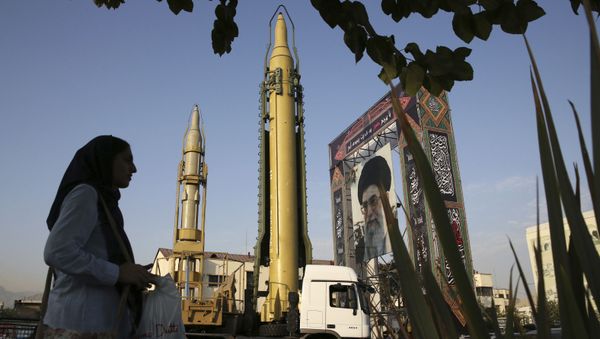 In this Sept. 24, 2017 file photo, surface-to-surface missiles and a portrait of the Iranian Supreme Leader Ayatollah Ali Khamenei are displayed by the Revolutionary Guard in an exhibition marking the anniversary of outset of the 1980s Iran-Iraq war, at Baharestan Square in Tehran, Iran. - Sputnik International