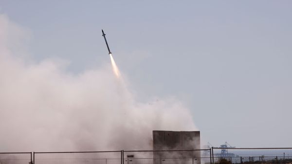 Israel's Iron Dome anti-missile system fires to intercept a rocket launched from the Gaza Strip towards Israel, as seen from Ashkelon, Israel May 12, 2021 - Sputnik International