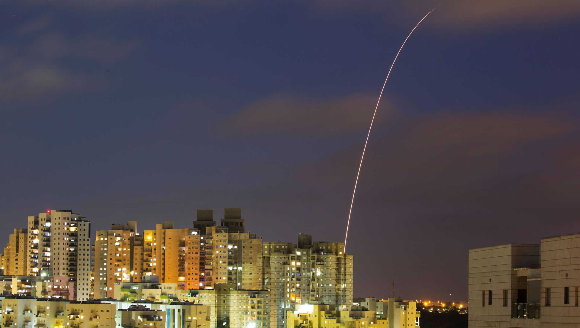 A streak of light is seen as Israel's Iron Dome anti-missile system try to intercept rockets launched from the Gaza Strip towards Israel, as seen from Ashkelon, Israel May 13, 2021. REUTERS/Amir Cohen A streak of light is seen as Israel's Iron Dome anti-missile system try to intercept rockets launched from the Gaza Strip towards Israel, as seen from Ashkelon, Israel May 13, 2021. REUTERS/Amir Cohen - Sputnik International, 1920, 15.05.2021