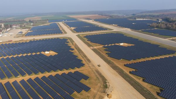 This aerial picture taken on April 20, 2021, shows a photovoltaic power station on the former Marville-Montmedy airbase in Marville, eastern France, on April 20, 2021 - Sputnik International