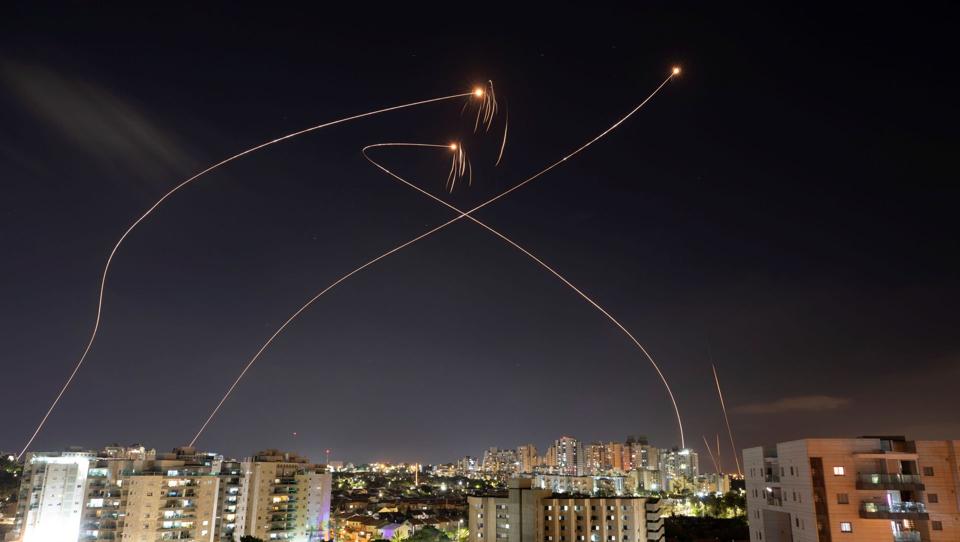 Streaks of light are seen as Israel's Iron Dome anti-missile system intercept rockets launched from the Gaza Strip towards Israel, as seen from Ashkelon, Israel May 13, 2021. Streaks of light are seen as Israel's Iron Dome anti-missile system intercept rockets launched from the Gaza Strip towards Israel, as seen from Ashkelon, Israel May 13, 2021. - Sputnik International, 1920, 13.05.2021