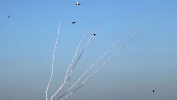 Rockets are launched by Palestinian militants into Israel, in Gaza May 13, 2021. - Sputnik International