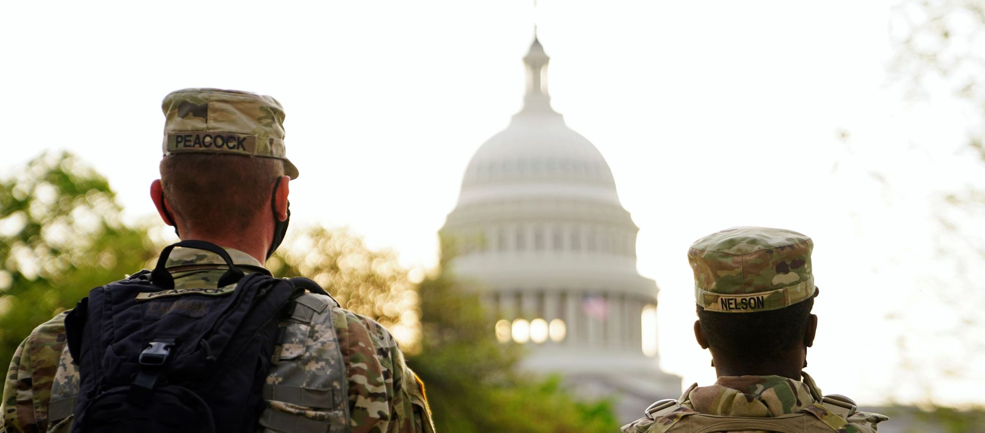 Members of the National Guard patrol the U.S. Capitol grounds prior to U.S. President Joe Biden's first address to a joint session of the U.S. Congress in Washington, U.S., April 28, 2021. Members of the National Guard patrol the U.S. Capitol grounds prior to U.S. President Joe Biden's first address to a joint session of the U.S. Congress in Washington, U.S., April 28, 2021. - Sputnik International, 1920, 20.05.2021