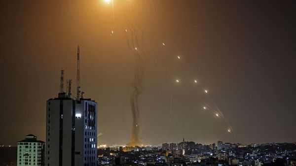 A rocket launched from Gaza city controlled by the Palestinian Hamas movement, is intercepted by Israel's Iron Dome aerial defence system, on May 11, 2021. - Sputnik International