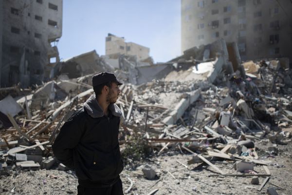 A Palestinian policeman stands in the rubble. A Palestinian policeman stands in the rubble. - Sputnik International