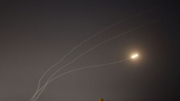 This picture taken from the southern Israeli city of Sderot shows rockets fired from the Gaza Strip being intercepted by the Israeli Iron Dome missile defence system, on May 16, 2021. - Sputnik International