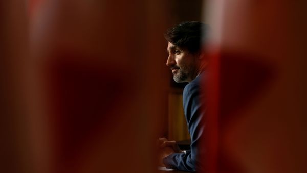 Canada's Prime Minister Justin Trudeau attends a news conference, as efforts continue to help slow the spread of the coronavirus disease (COVID-19), in Ottawa, Ontario, Canada May 18, 2021 - Sputnik International