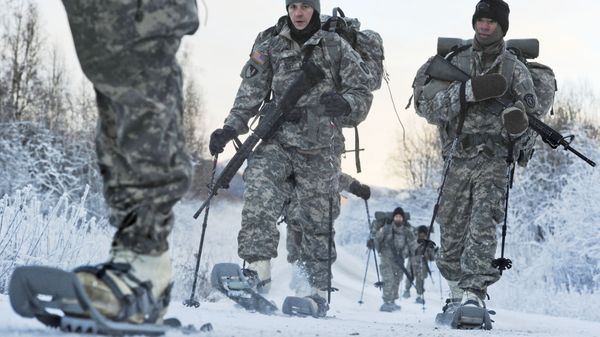 In this Dec. 6, 2012 photo provided by the U.S. Department of Defense, soldiers assigned to 6th Engineer Battalion utilize snow shoes during Arctic Light Individual Training on the Bulldog Trail in sub-zero conditions at Joint Base Elmendorf-Richardson, Alaska.  ALIT is the United States Army Alaska's Cold Weather Indoctrination program. It gives all soldiers, regardless of their job, the foundation to successfully work, train, and go to war in some of the harshest environments in the world.  - Sputnik International