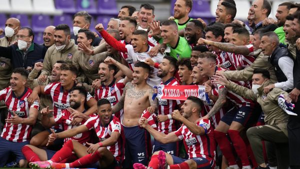 Atletico Madrid players celebrate at the end of the Spanish La Liga soccer match between Atletico Madrid and Valladolid at the Jose Zorrilla stadium in Valladolid, Spain, Saturday, May 22, 2021. Atletico won 2-1 and clinches its 11th Spanish La Liga title. Atletico Madrid players celebrate at the end of the Spanish La Liga soccer match between Atletico Madrid and Valladolid at the Jose Zorrilla stadium in Valladolid, Spain, Saturday, May 22, 2021. Atletico won 2-1 and clinches its 11th Spanish La Liga title. - Sputnik International