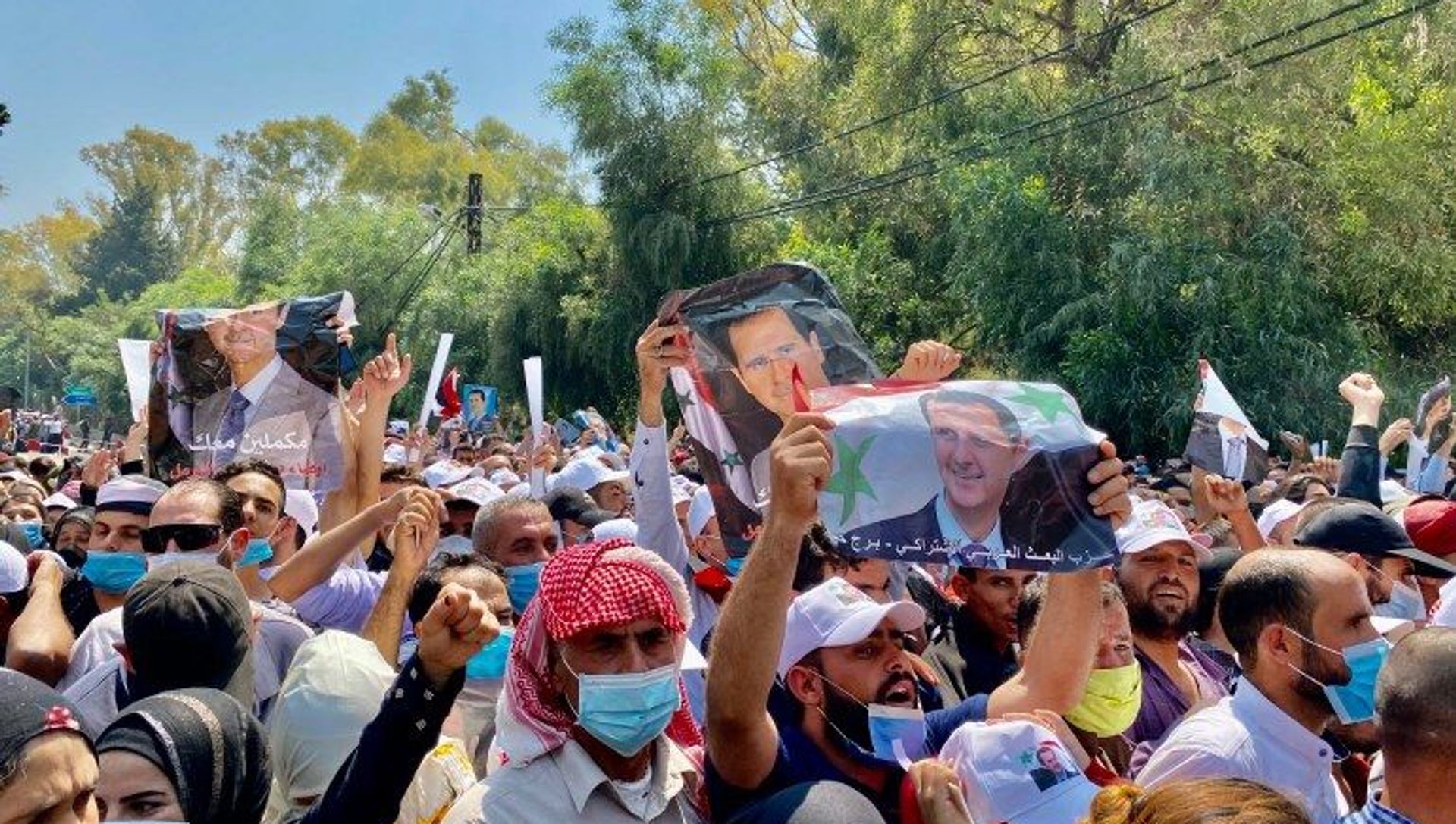 Demonstration of Bashar al-Assad supportedrs in Damascus ahead of presidential election, 22 May, 2021 Demonstration of Bashar al-Assad supportedrs in Damascus ahead of presidential election, 22 May, 2021 - Sputnik International, 1920, 22.05.2021