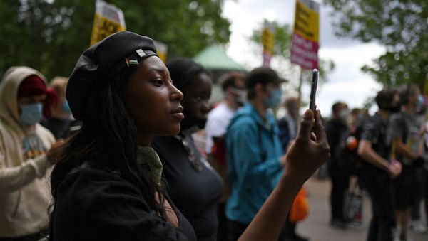 FILE - In this Saturday, June 13, 2020 file photo Sasha Johnson, of the Black Lives Matter movement attends a protest at Hyde Park in London FILE - In this Saturday, June 13, 2020 file photo Sasha Johnson, of the Black Lives Matter movement attends a protest at Hyde Park in London - Sputnik International