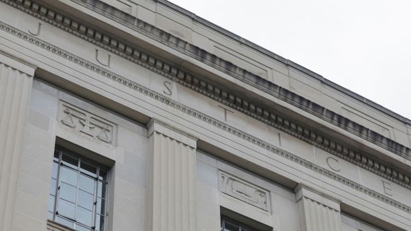 The word justice is seen engraved at the headquarters of the United States Department of Justice (DOJ) in Washington, D.C., U.S., May 10, 2021. - Sputnik International