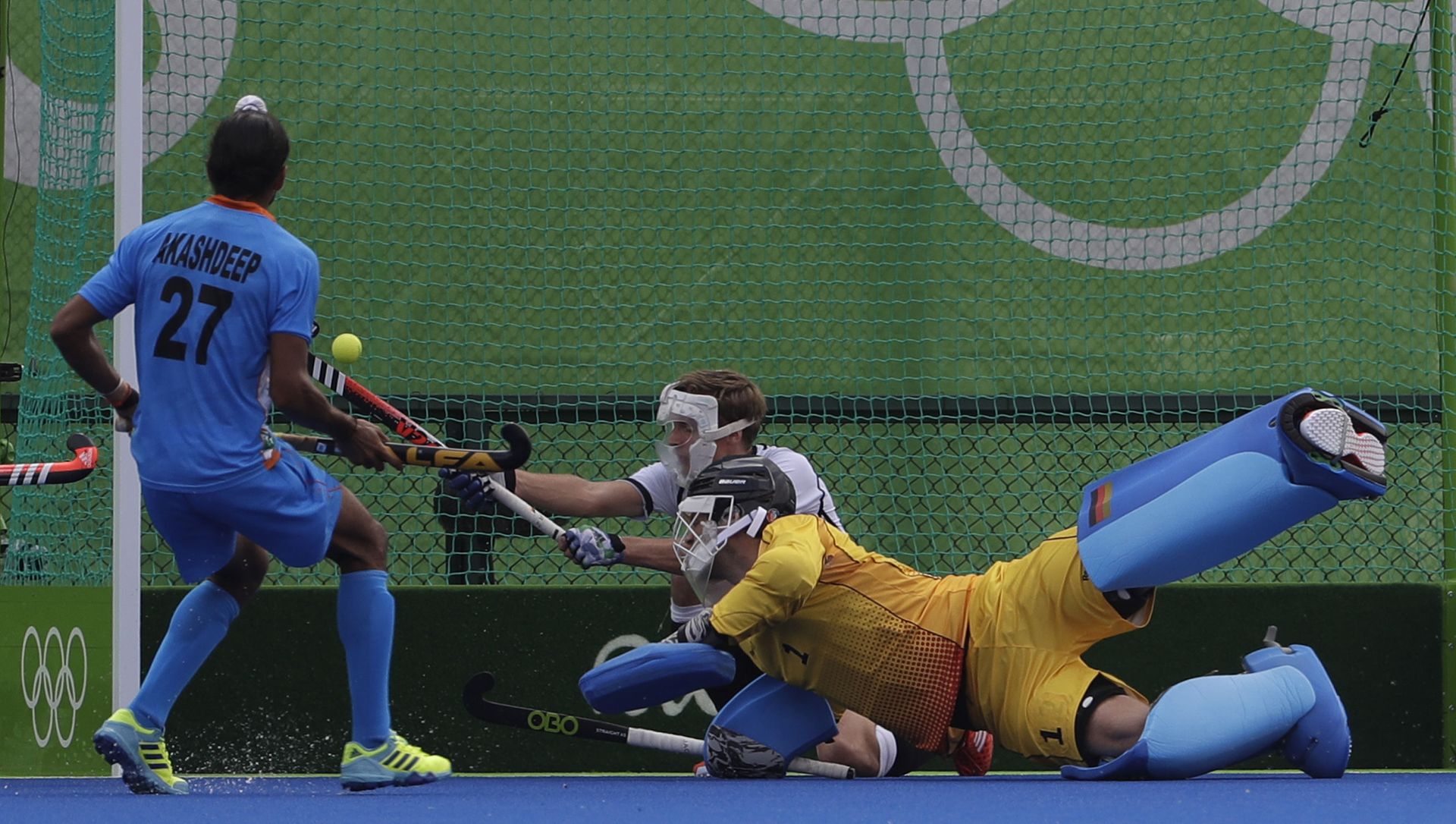 Germany's goalkeeper Nicolas Jacobi, center, looks for the ball enter his goal which scored by Indian player India's Rupinder Pal Singh during a men's field hockey match (File) Germany's goalkeeper Nicolas Jacobi, center, looks for the ball enter his goal which scored by Indian player India's Rupinder Pal Singh during a men's field hockey match (File) - Sputnik International, 1920, 25.05.2021