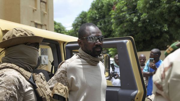In this Monday, Aug. 24, 2020 file photo, Col. Assimi Goita, declared himself the leader of the National Committee for the Salvation of the People, arrives to meet with a regional delegation at the Ministry of Defense in the capital Bamako, Mali.  - Sputnik International