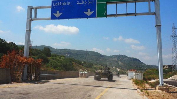 In this handout video grab released by Russian Defence Ministry, Russian armored vehicles are seen during a joint patrol with the Turkish military, in Idlib, Syria - Sputnik International