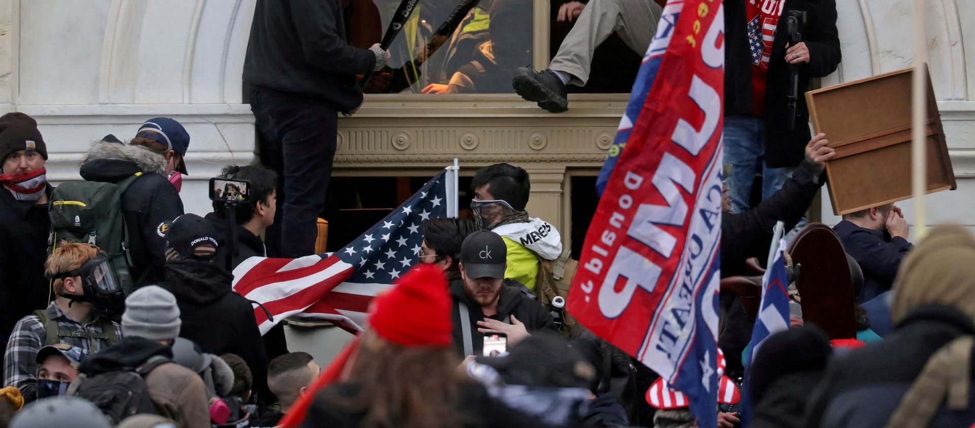 The US Capitol Building is stormed by pro-Trump protesters on Jan. 6, 2021 - Sputnik International, 1920, 26.05.2021