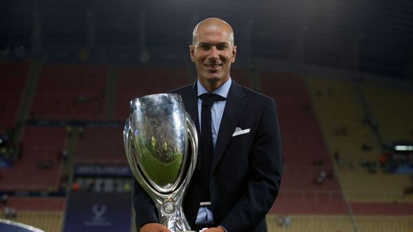 Soccer Football - Real Madrid v Manchester United - Super Cup Final - Skopje, Macedonia - 8 August 2017. Real Madrid coach Zinedine Zidane celebrates winning the super cup final with the trophy. - Sputnik International