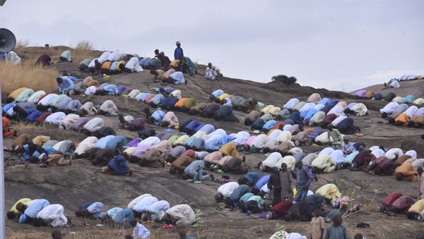 Muslims perform an Eid al-Fitr prayer in an outdoor area in Bauchi, Nigeria on Thursday, 13 May 2021. - Sputnik International