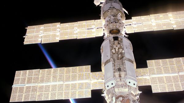 This photo provided by NASA shows the International Space Station as seen from Space Shuttle Atlantis during mission STS-106, which delivered supplies and performed maintenance in September 2000.  - Sputnik International