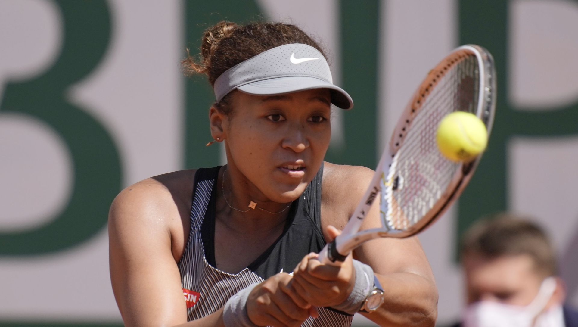 Japan's Naomi Osaka returns the ball to Romania's Patricia Maria Tig during their first round match of the French open tennis tournament at the Roland Garros stadium Sunday, 30 May 2021 in Paris. Japan's Naomi Osaka returns the ball to Romania's Patricia Maria Tig during their first round match of the French open tennis tournament at the Roland Garros stadium Sunday, 30 May 2021 in Paris. - Sputnik International, 1920, 18.06.2021