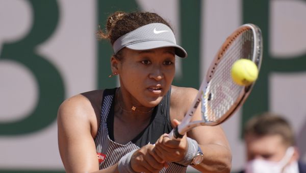 Japan's Naomi Osaka returns the ball to Romania's Patricia Maria Tig during their first round match of the French open tennis tournament at the Roland Garros stadium Sunday, 30 May 2021 in Paris. Japan's Naomi Osaka returns the ball to Romania's Patricia Maria Tig during their first round match of the French open tennis tournament at the Roland Garros stadium Sunday, 30 May 2021 in Paris. - Sputnik International